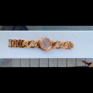 Micheal kors twist watch in rose gold